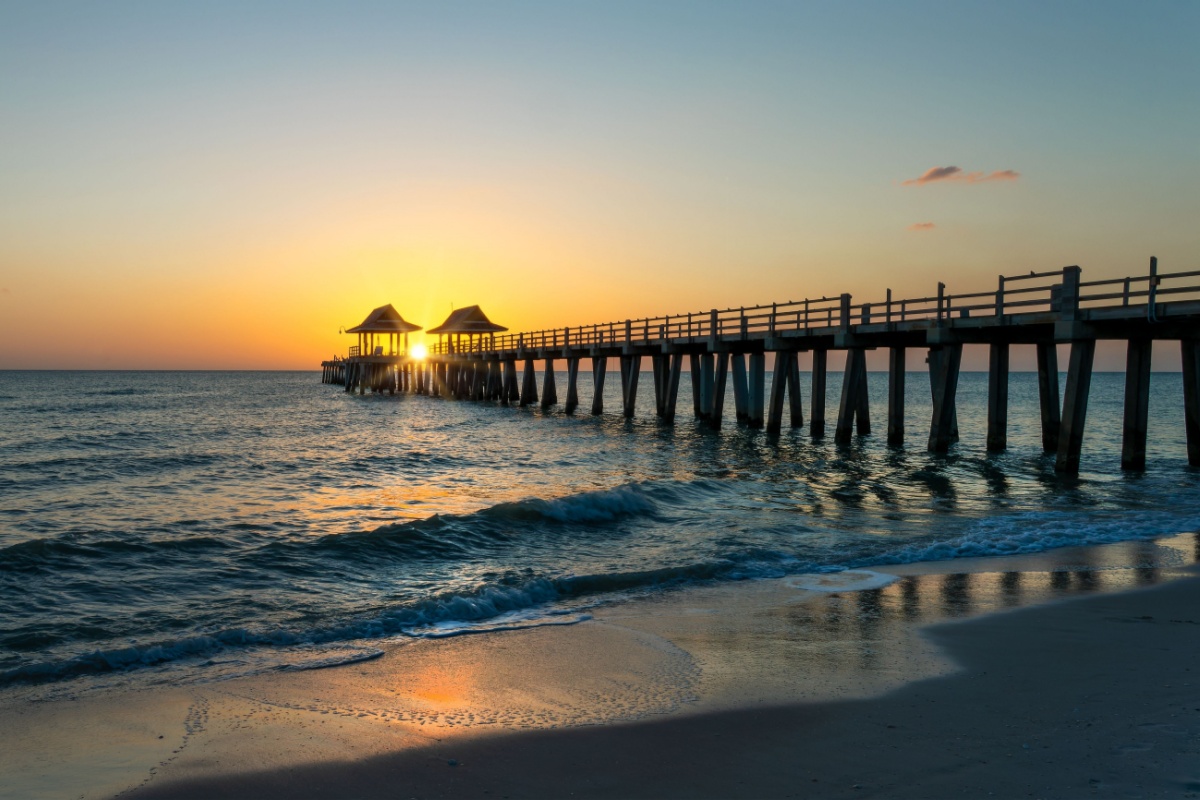 sunset at a dock in Naples, Florida