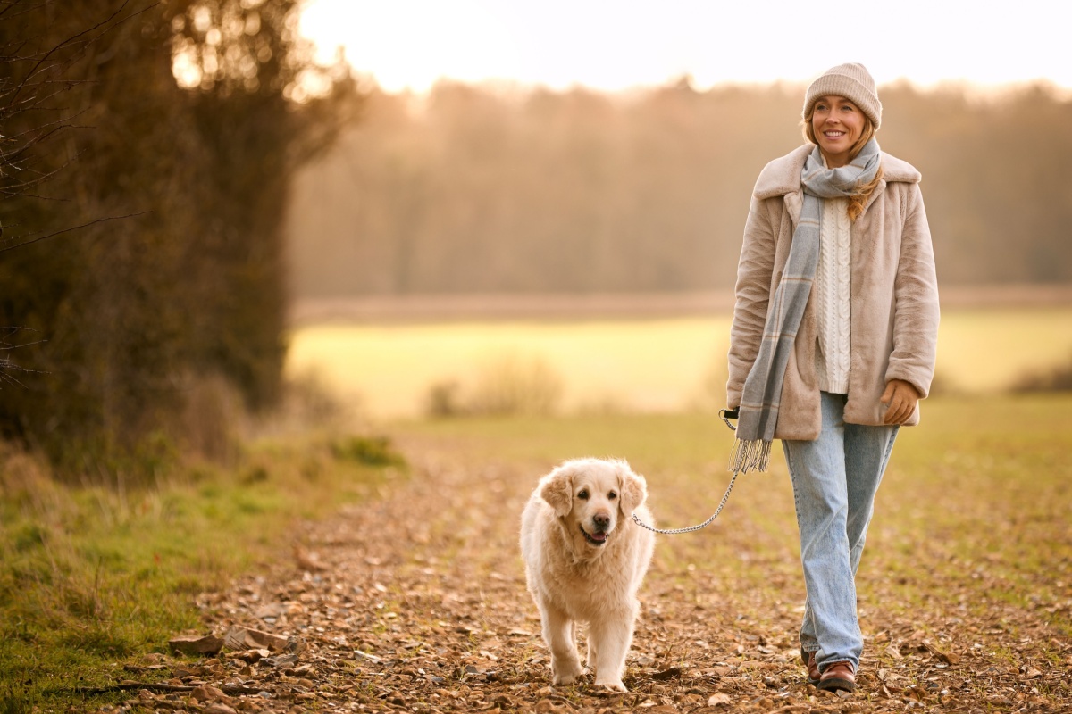 woman walking a dog