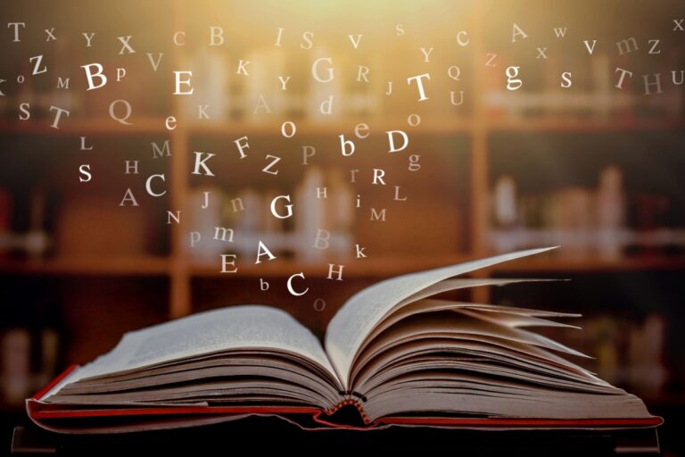 letters coming out from a book