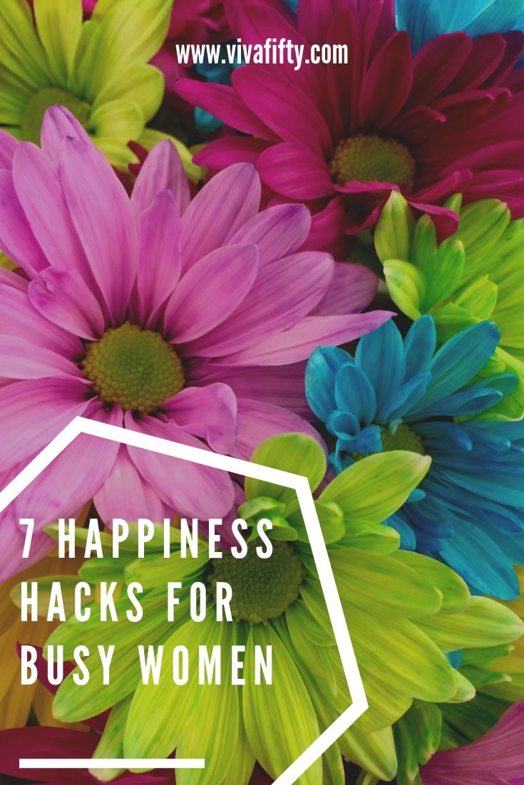 Happiness is elusive but attainable. Believe it or not, it takes some practice. Here are seven simple tips to help you achieve it. #happy #midlife #women