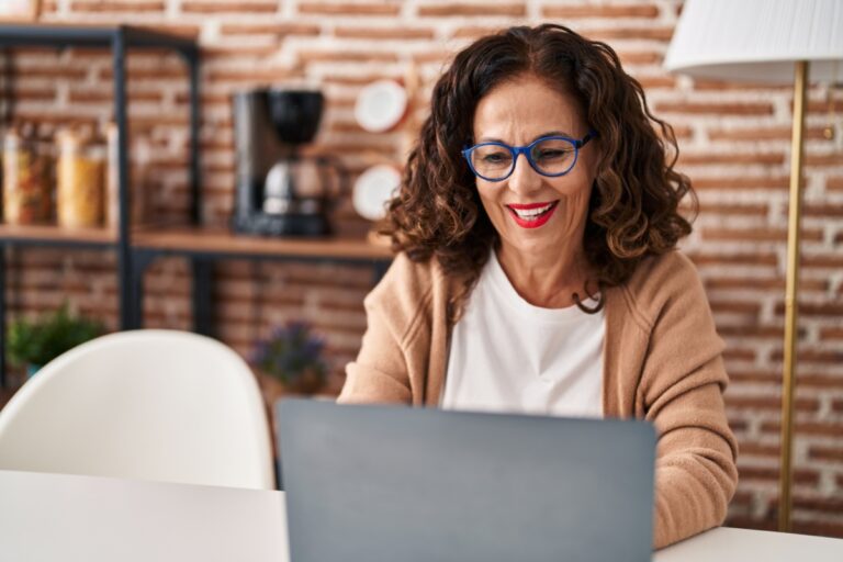 middle aged woman on her laptop