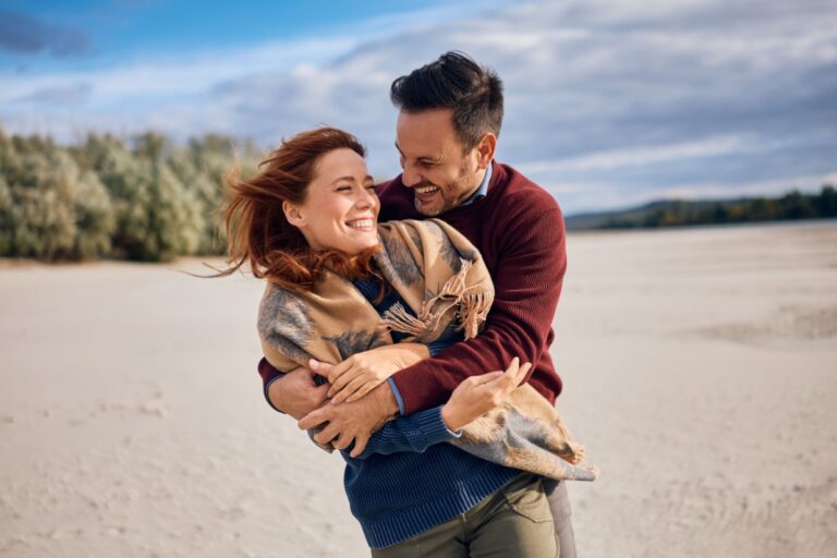 happy couple at the beach