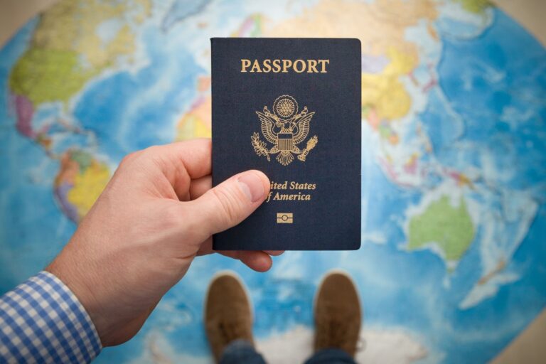 man holding a US passport