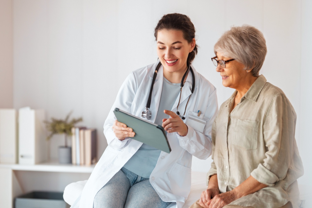 middle aged woman with her doctor