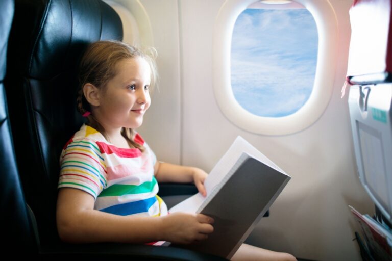 little girl alone in a plane