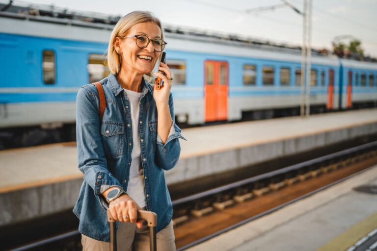 midlife woman at a train station