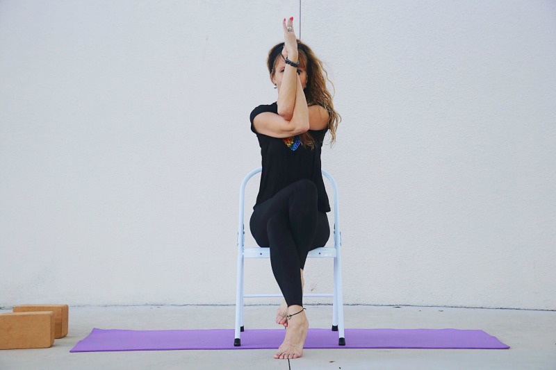 5 Yoga poses you can do sitting in a chair