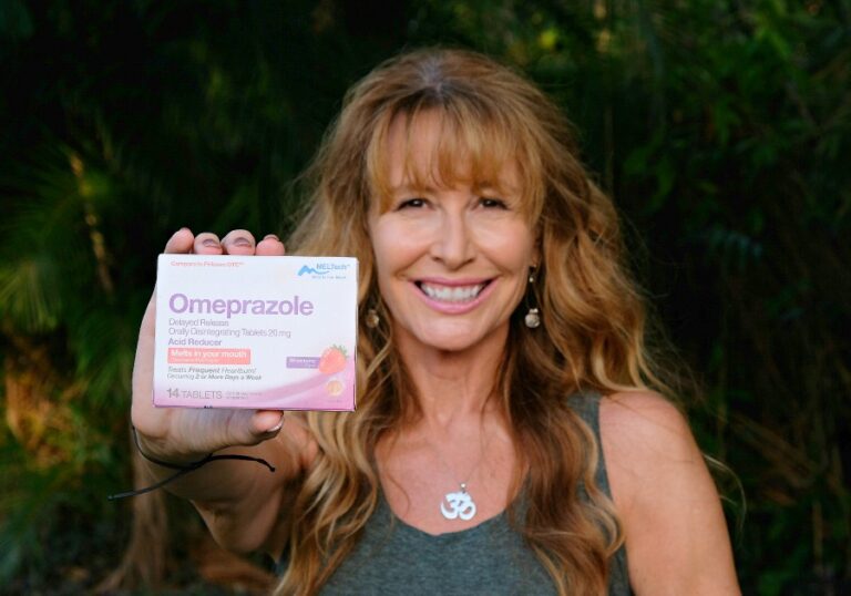 Lorraine C. Ladish w Omeprazole