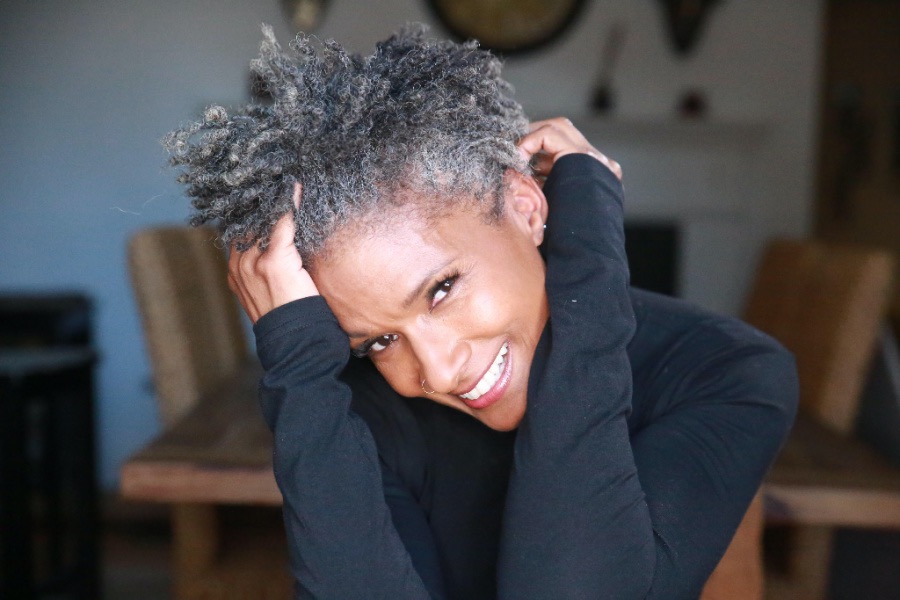 Carla Kemp was a model in her teens, took an extended break, and then came back to modeling in her 50s. She embraces her natural hair and owns her power.