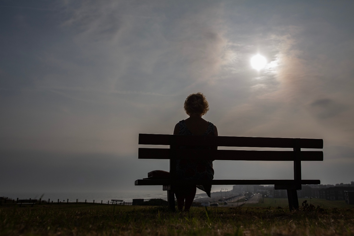woman sitting outdoors