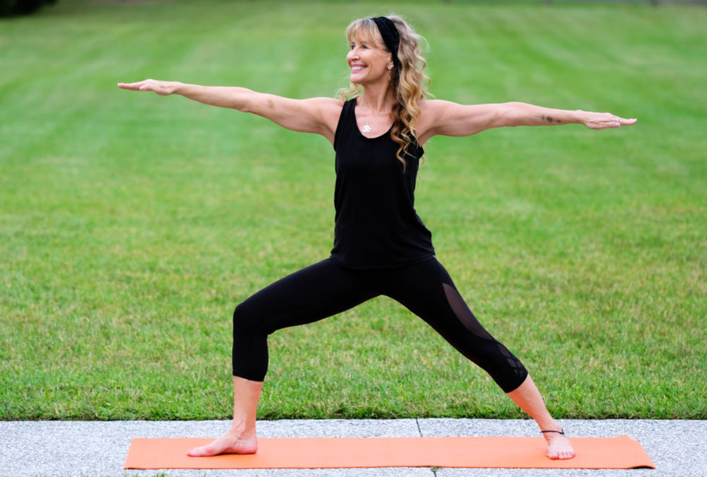 In midlife and beyond, back pain is extremely prevalent. Here are 4 yoga poses that can help alleviate it.