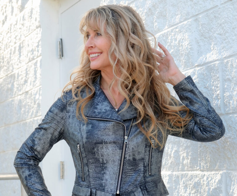 Slow, classic, comfortable and wrinkle-free style is embodied by this black jumpsuit and classic vegan leather jackets.