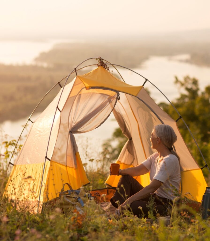 Mature woman camping