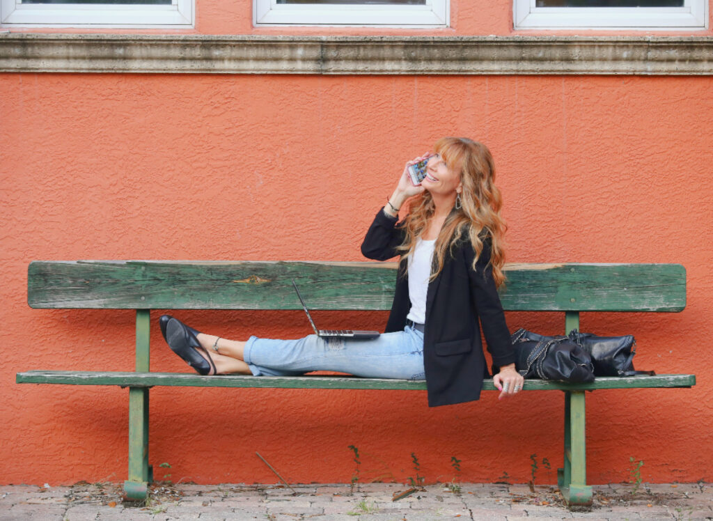 Lorraine C. Ladish - midlife influencer on the phone