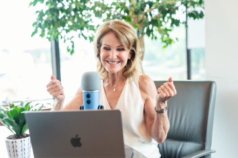 Sharon Macey on her laptop